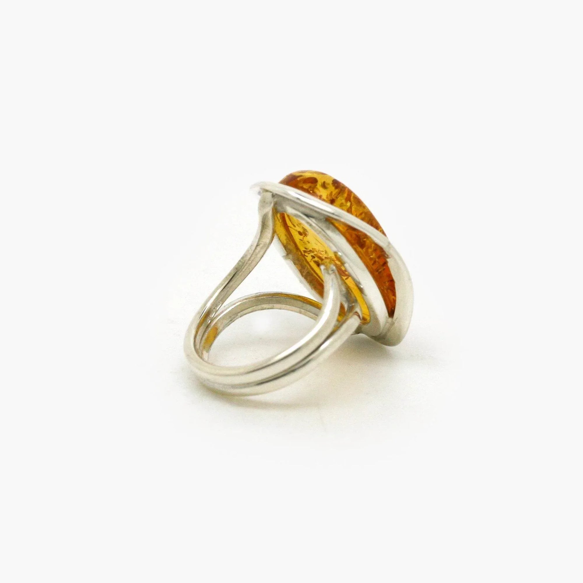 Adjustable Silver & Honey Amber Surround Ring - Jordans Jewellers