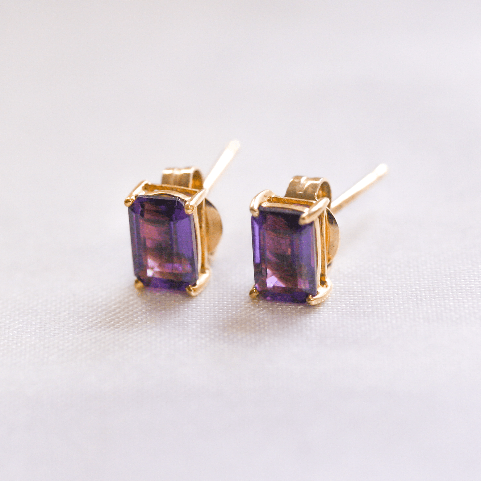 9 Carat Yellow Gold Rectangular Amethyst Stud Earrings - Jordans Jewellers