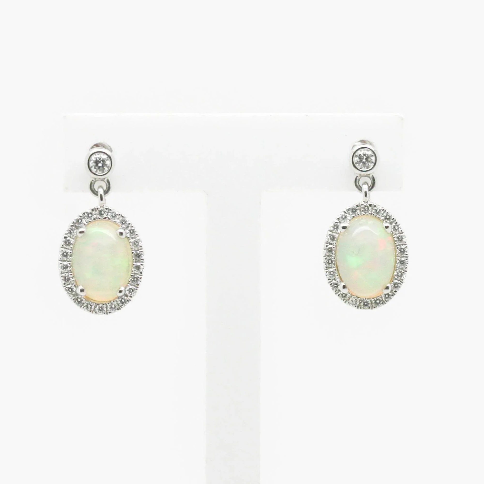 18 Carat White Gold Opal & 0.19 Carat Diamond Halo Drop Earrings - Jordans Jewellers