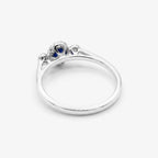 9ct White Gold Sapphire & Diamond 0.10ct Halo Ring close up