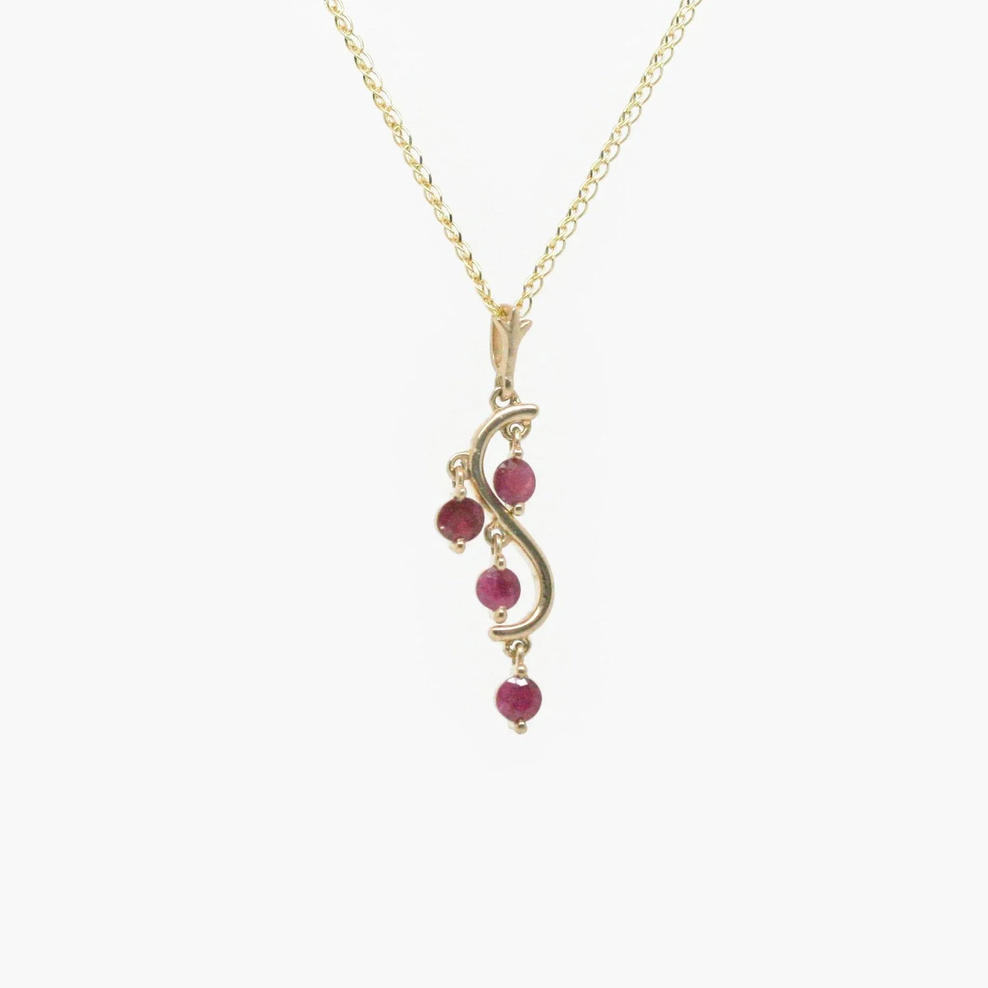 9 Carat Gold Four Stone Ruby Drop Pendant Necklace - Jordans Jewellers