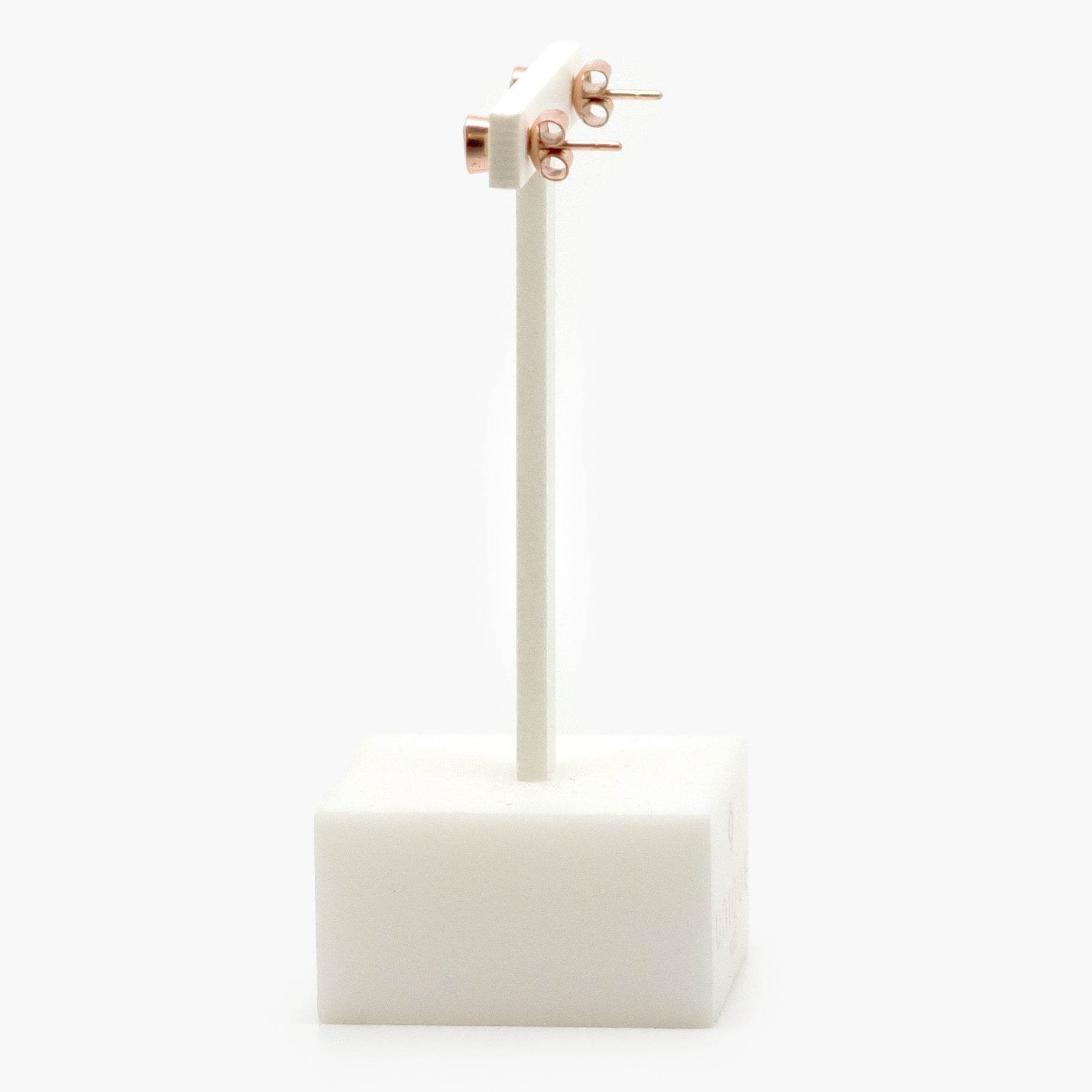 NEW 9ct Rose Gold Oval Ruby Stud Earrings - Jordans Jewellers