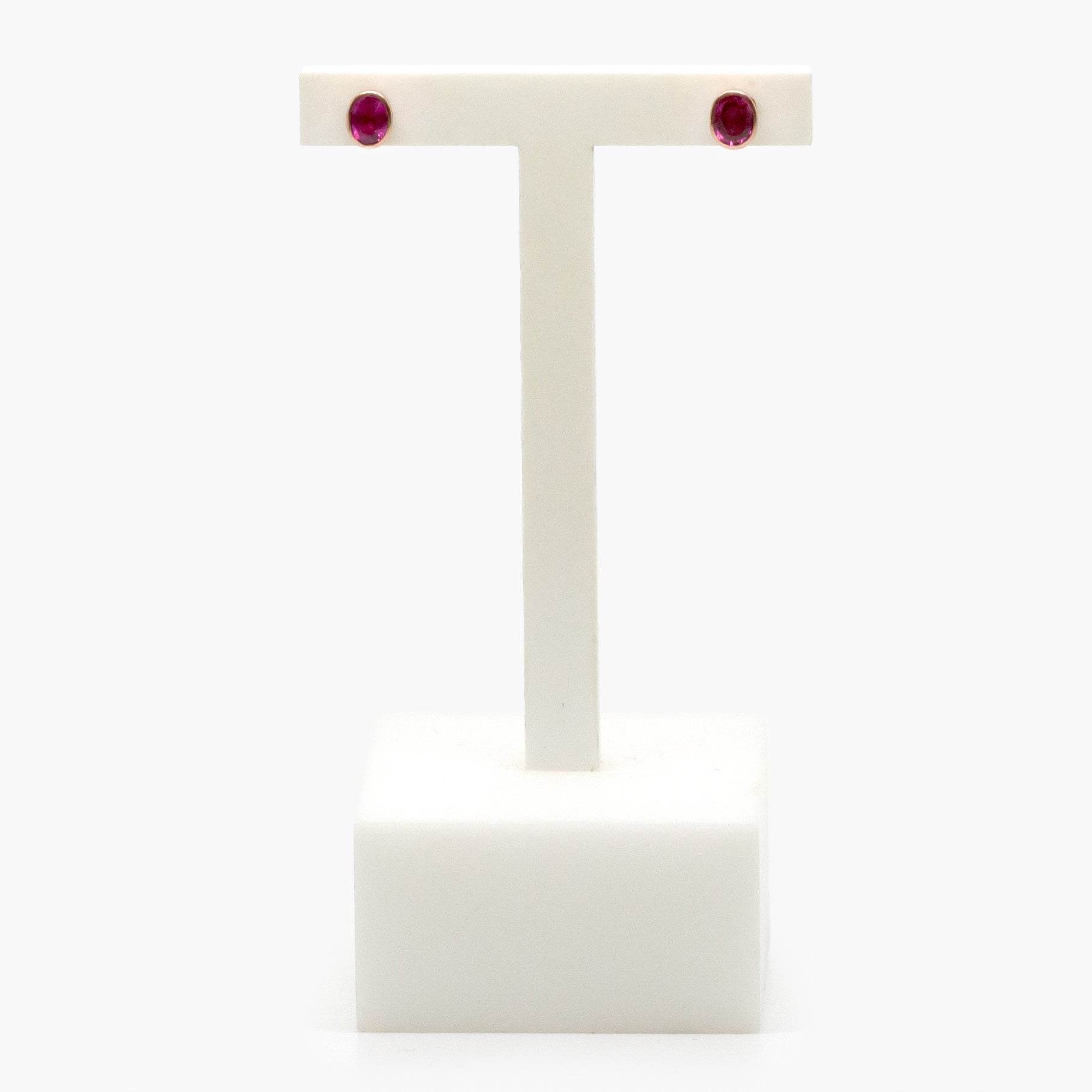 NEW 9ct Rose Gold Oval Ruby Stud Earrings - Jordans Jewellers