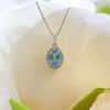 NEW 9ct White Gold Oval Blue Topaz and Diamond Cluster Pendant Necklace