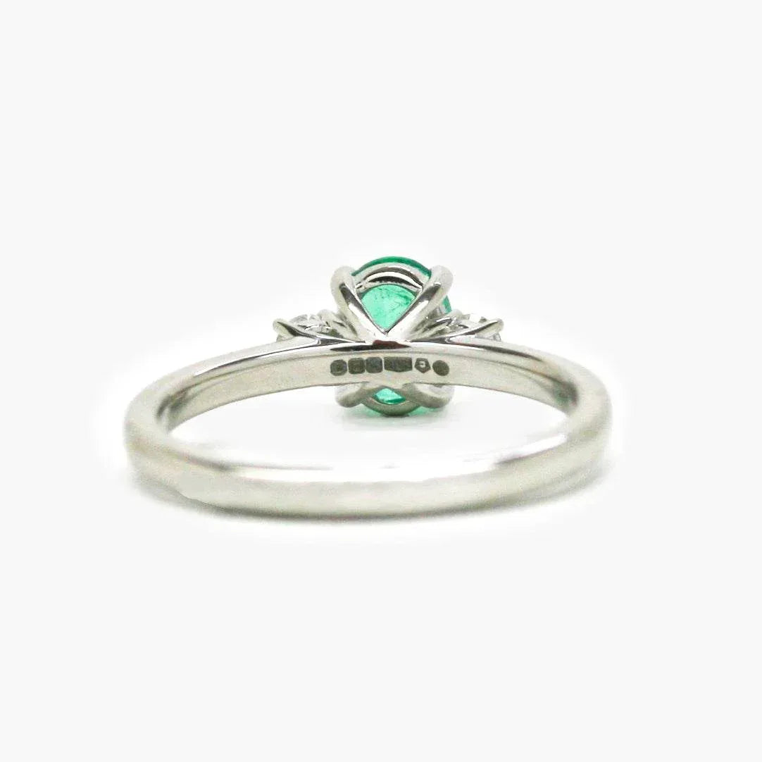 NEW Three Stone Ring with Oval Emerald and Diamonds - Jordans Jewellers