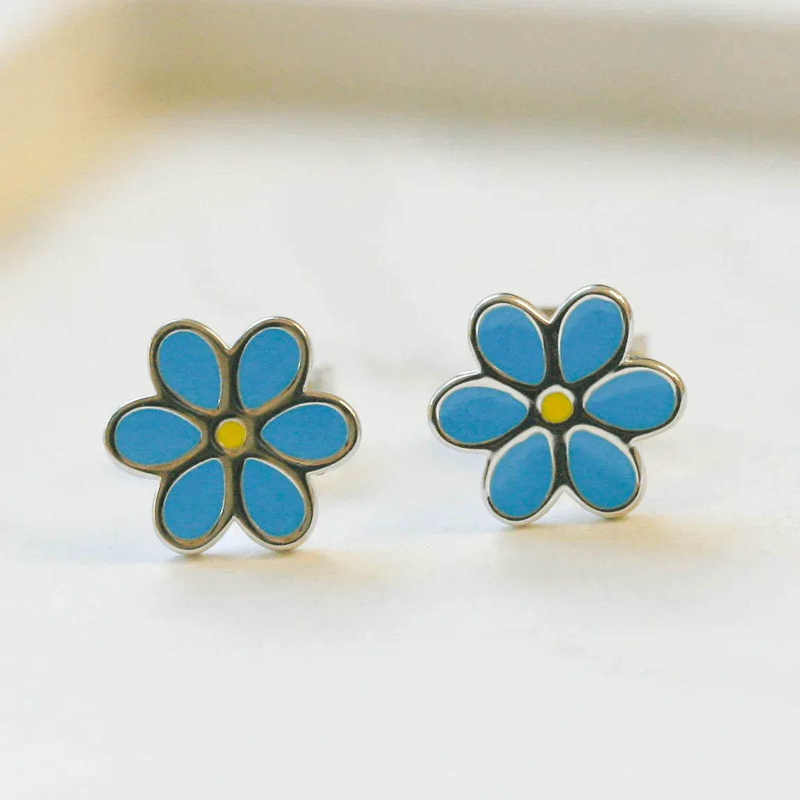 NEW Silver Blue Flower Stud Earrings - Jordans Jewellers