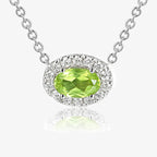 NEW 9ct White Gold Horizontal Oval Shape Peridot Pendant with Diamond Cluster Necklace - Jordans Jewellers