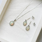 18 Carat White Gold Opal & 0.19 Carat Diamond Halo Drop Earrings - Jordans Jewellers
