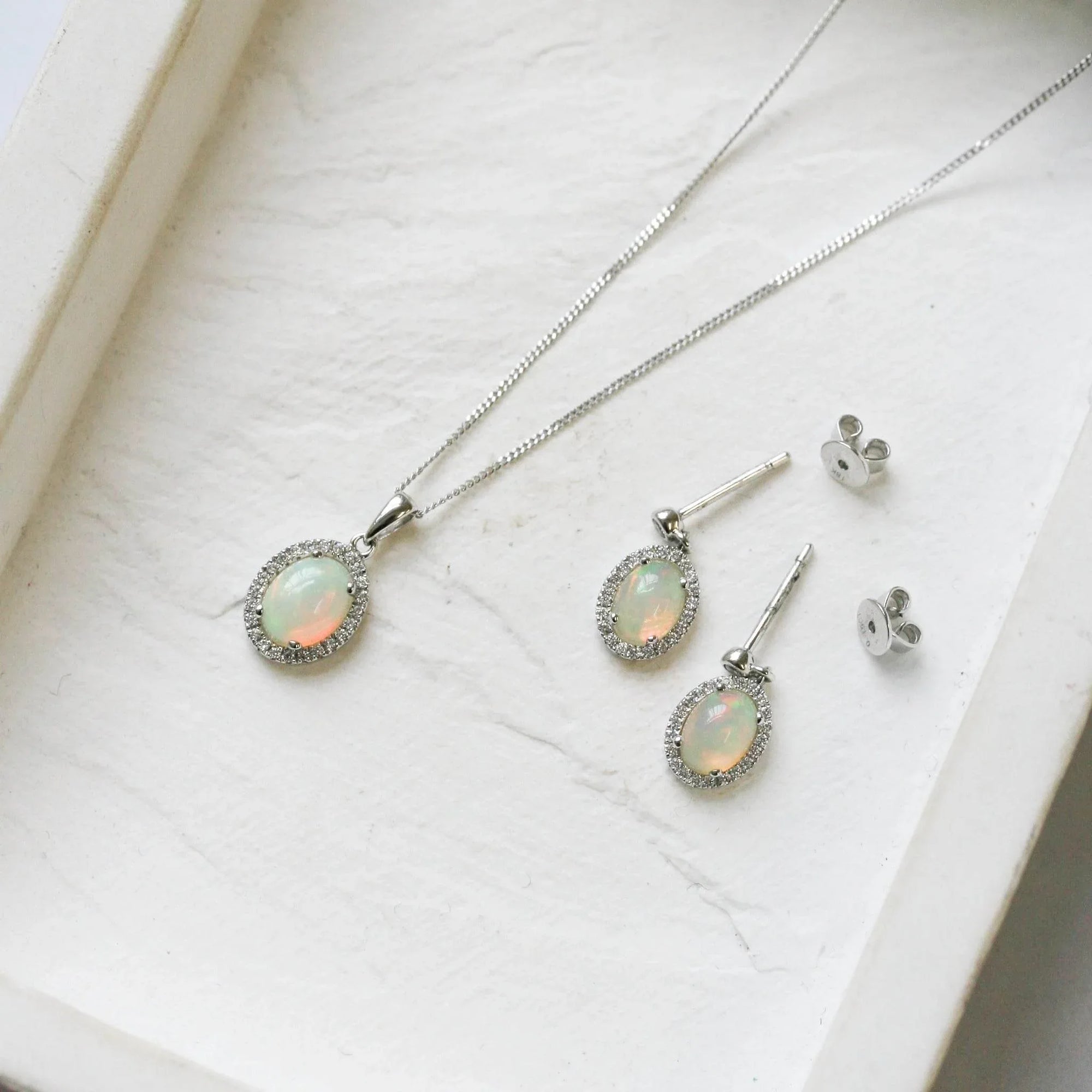 18 Carat White Gold Opal & 0.19 Carat Diamond Halo Drop Earrings - Jordans Jewellers