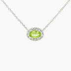 NEW 9ct White Gold Horizontal Oval Shape Peridot Pendant with Diamond Cluster Necklace - Jordans Jewellers