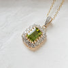 Peridot and diamond cluster pendant side view