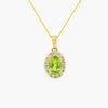 Peridot and diamond cluster pendant on a 9 carat yellow gold chain 