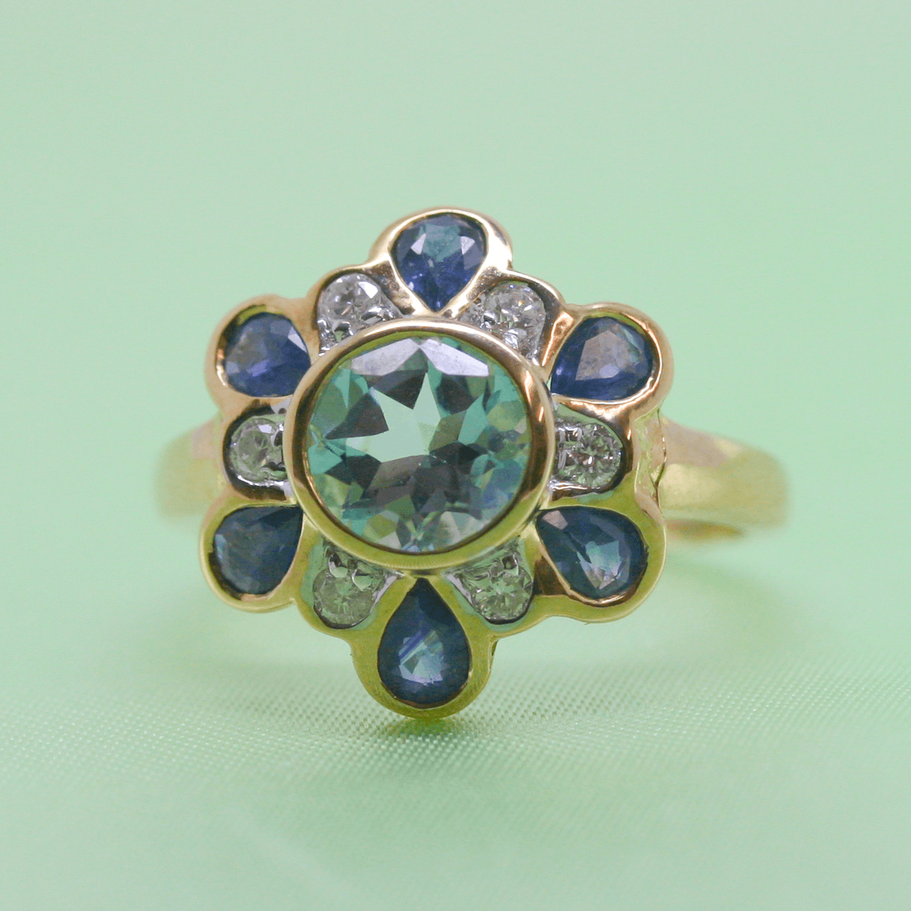 New 9 Carat Yellow Gold Blue Topaz, Sapphire and Diamond Flower Ring - Jordans Jewellers