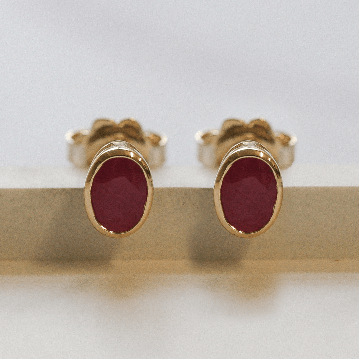 NEW 9 Carat Yellow Gold Ruby Rubover Stud Earrings - Jordans Jewellers
