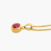 Ruby pendant necklace on white background 