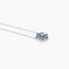 side view of a 6 leaf blue cubic zirconia flower necklace with a silver trace chain