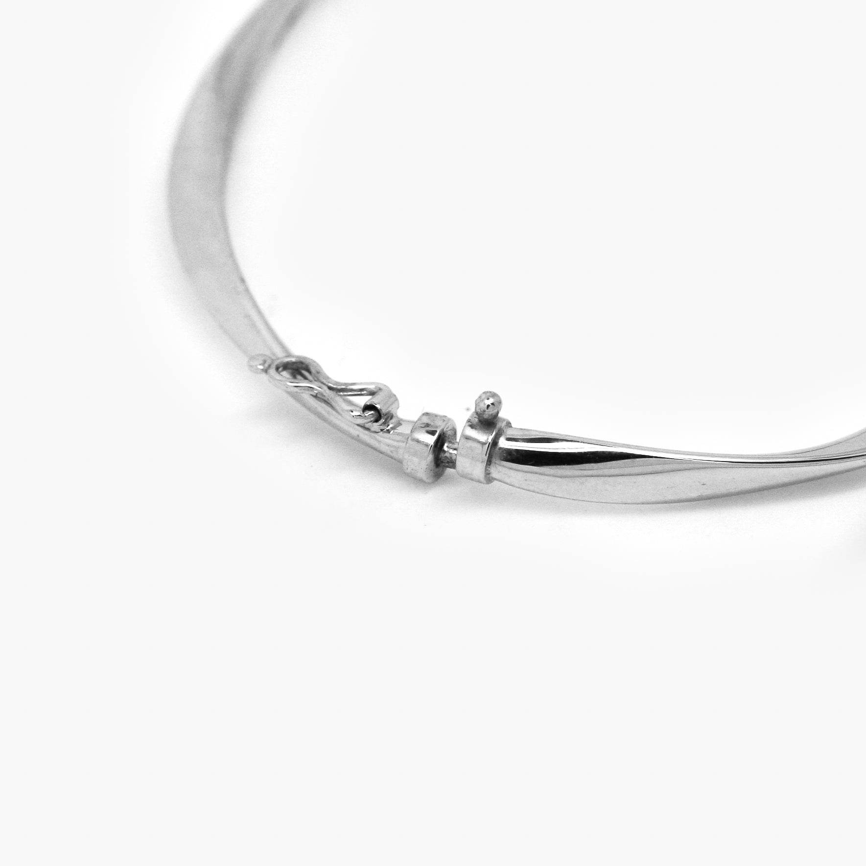 9ct White Gold Twist Hinged Bangle