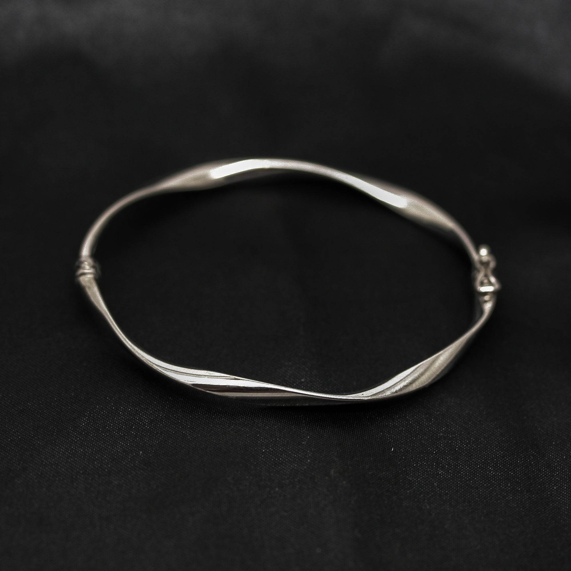 9ct White Gold Twist Hinged Bangle