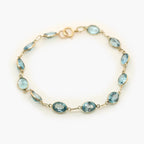 Blue Topaz Bracelet 9ct Yellow Gold - Jordans Jewellers