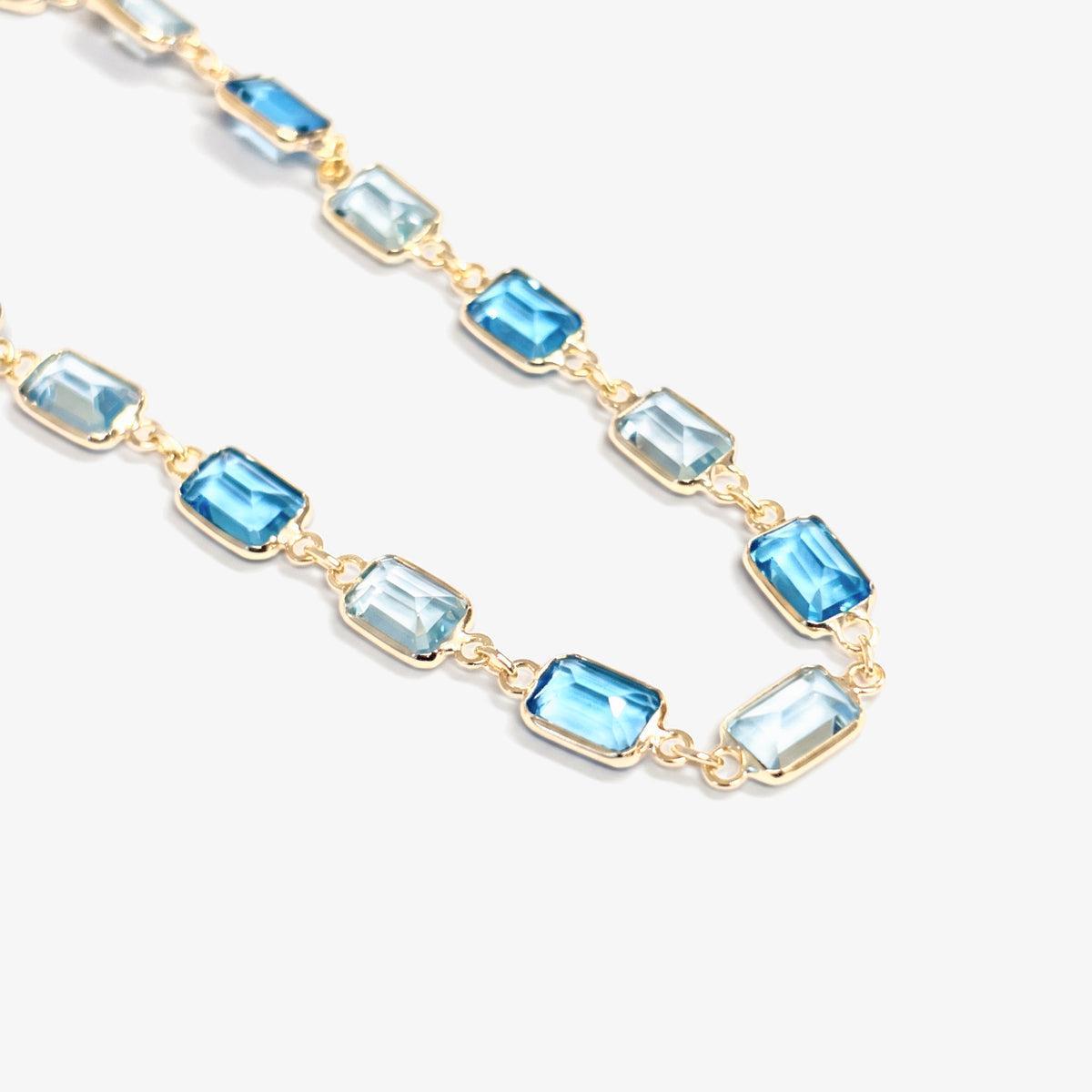 9ct Yellow Gold Blue Topaz Bracelet