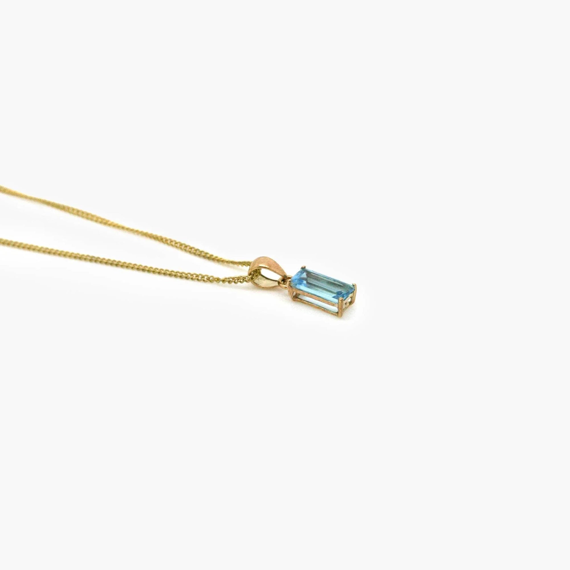 Blue Topaz Baguette Pendant Necklace in 9ct Yellow Gold - Jordans Jewellers