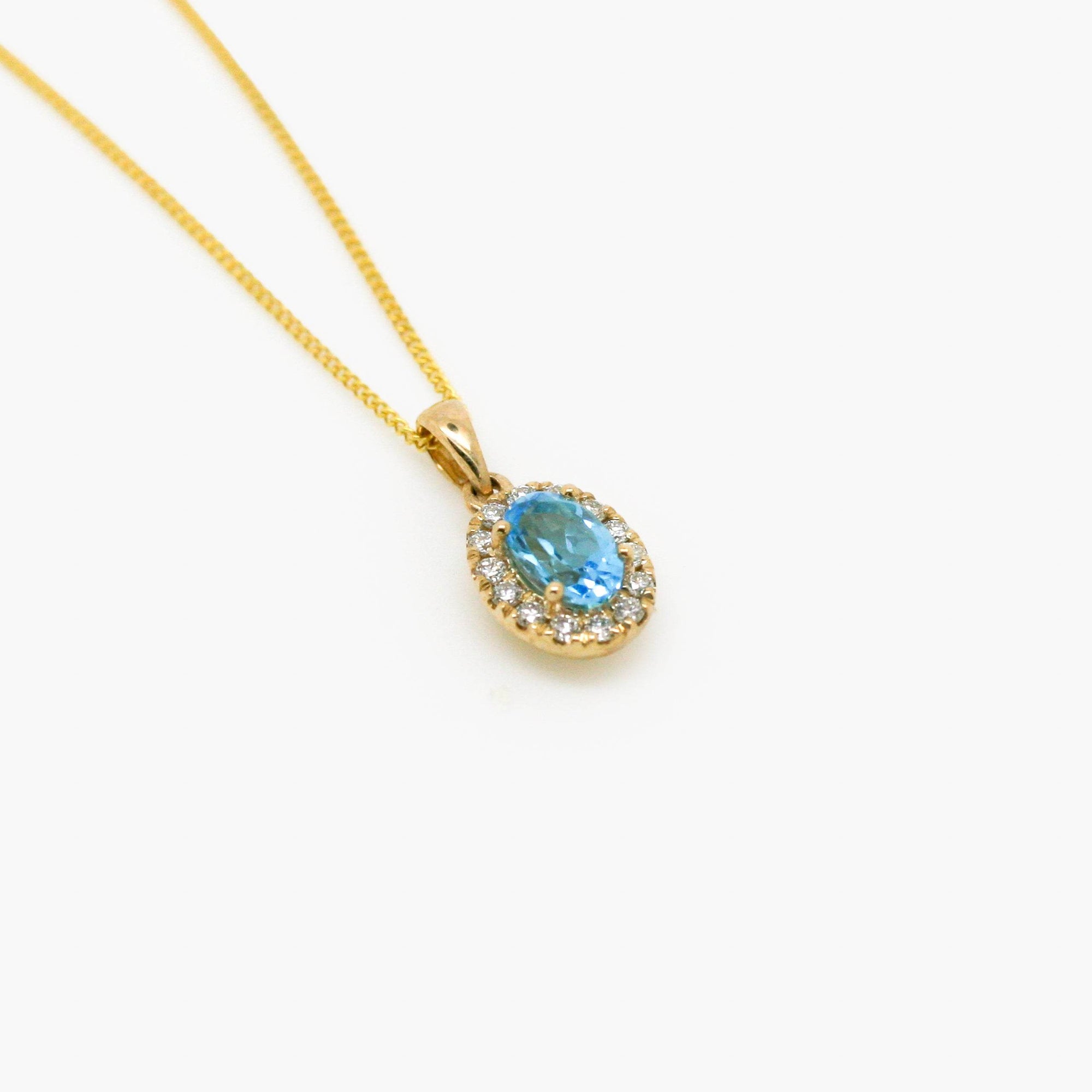 Swiss Blue Topaz & Diamond Pendant Necklace - 9ct Yellow Gold - Jordans Jewellers