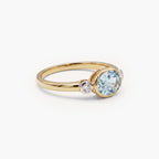 9ct Yellow Gold Oval Blue Topaz and Diamond Ring front view