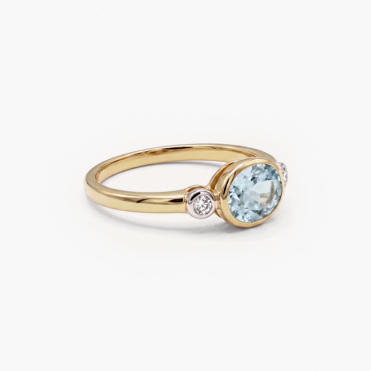 9ct Yellow Gold Oval Blue Topaz and Diamond Ring front view