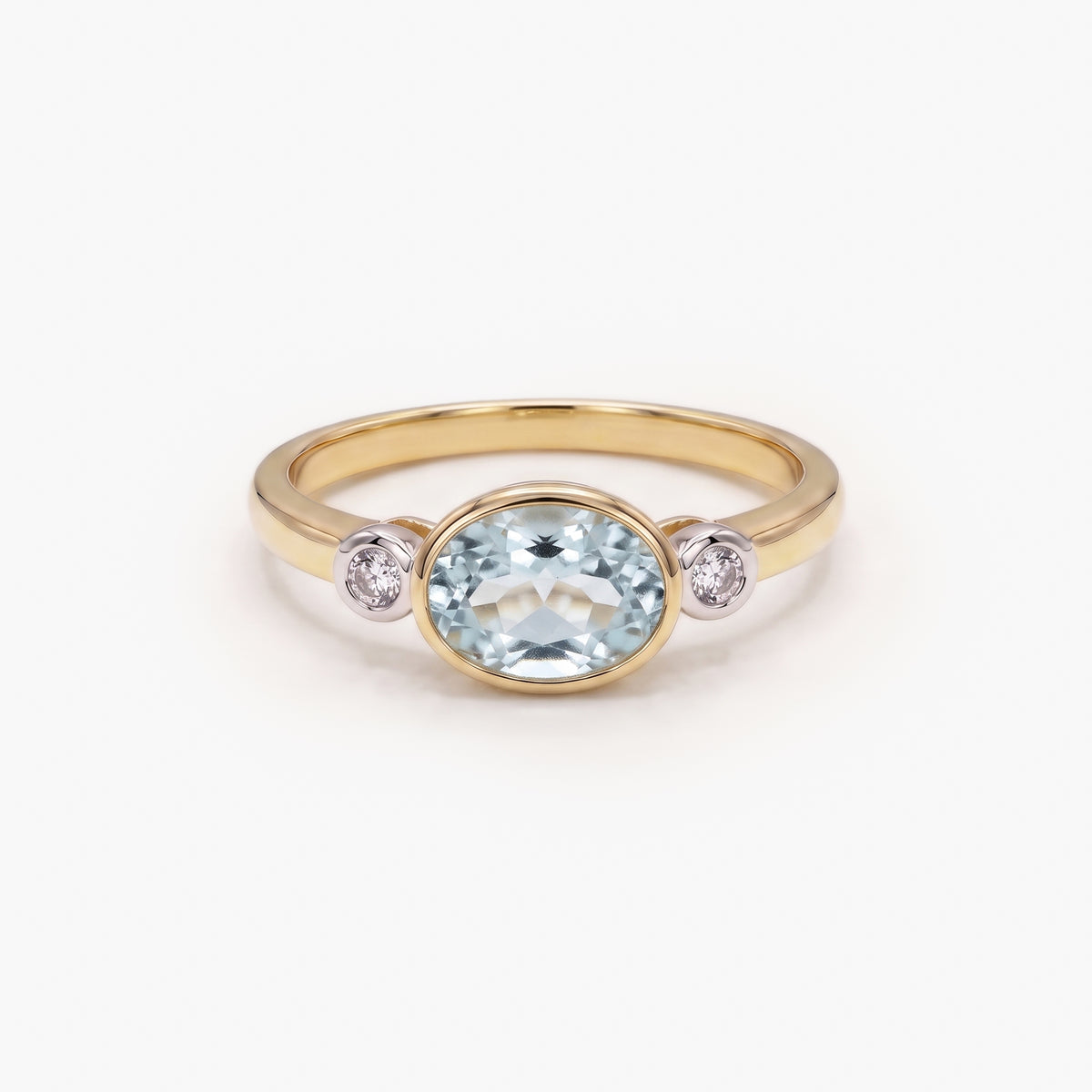 9ct Yellow Gold Oval Blue Topaz and Diamond Ring side view