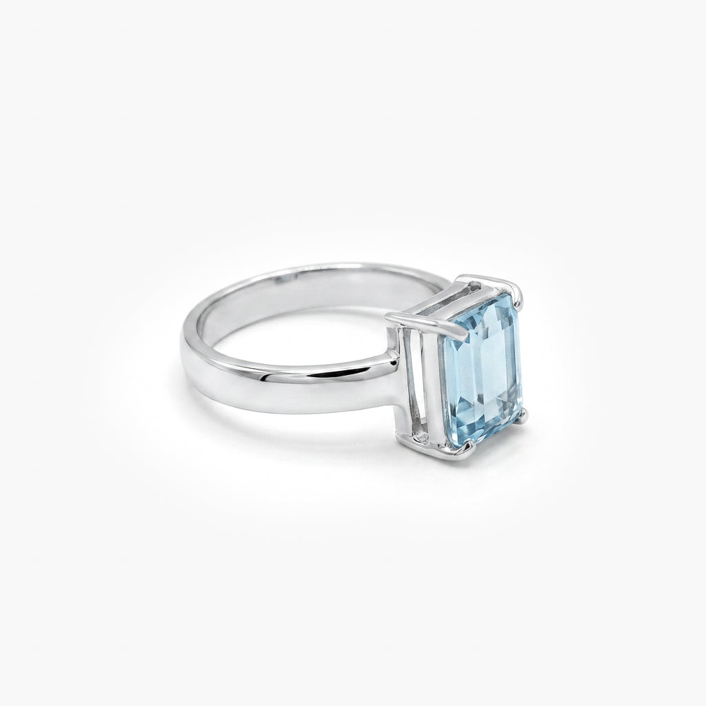 Silver Blue Topaz Emerald Cut Solitaire Ring
