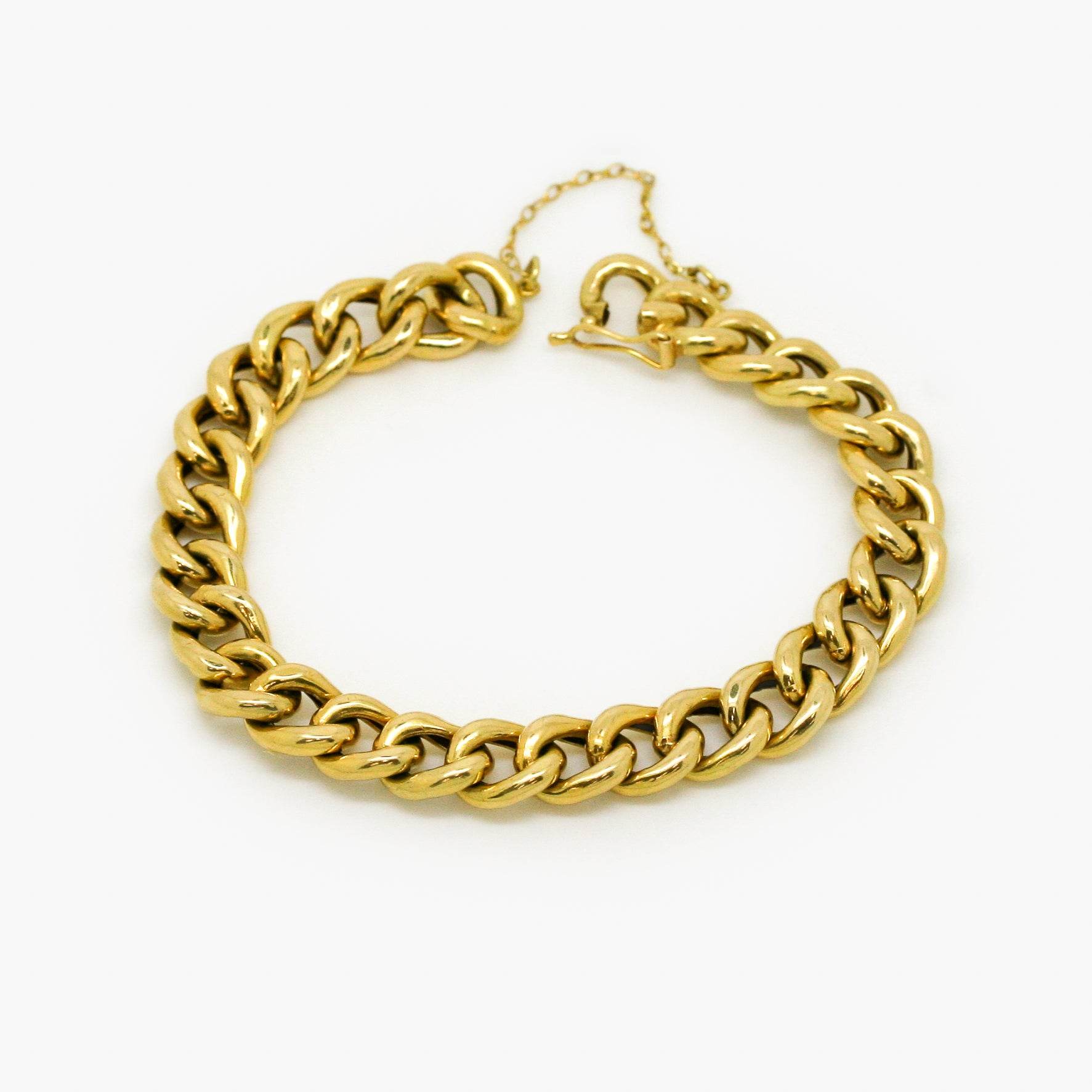 18ct Yellow Gold 9mm Curb Link Bracelet - Jordans Jewellers