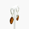 amber drop earrings with silver leaf edge side view