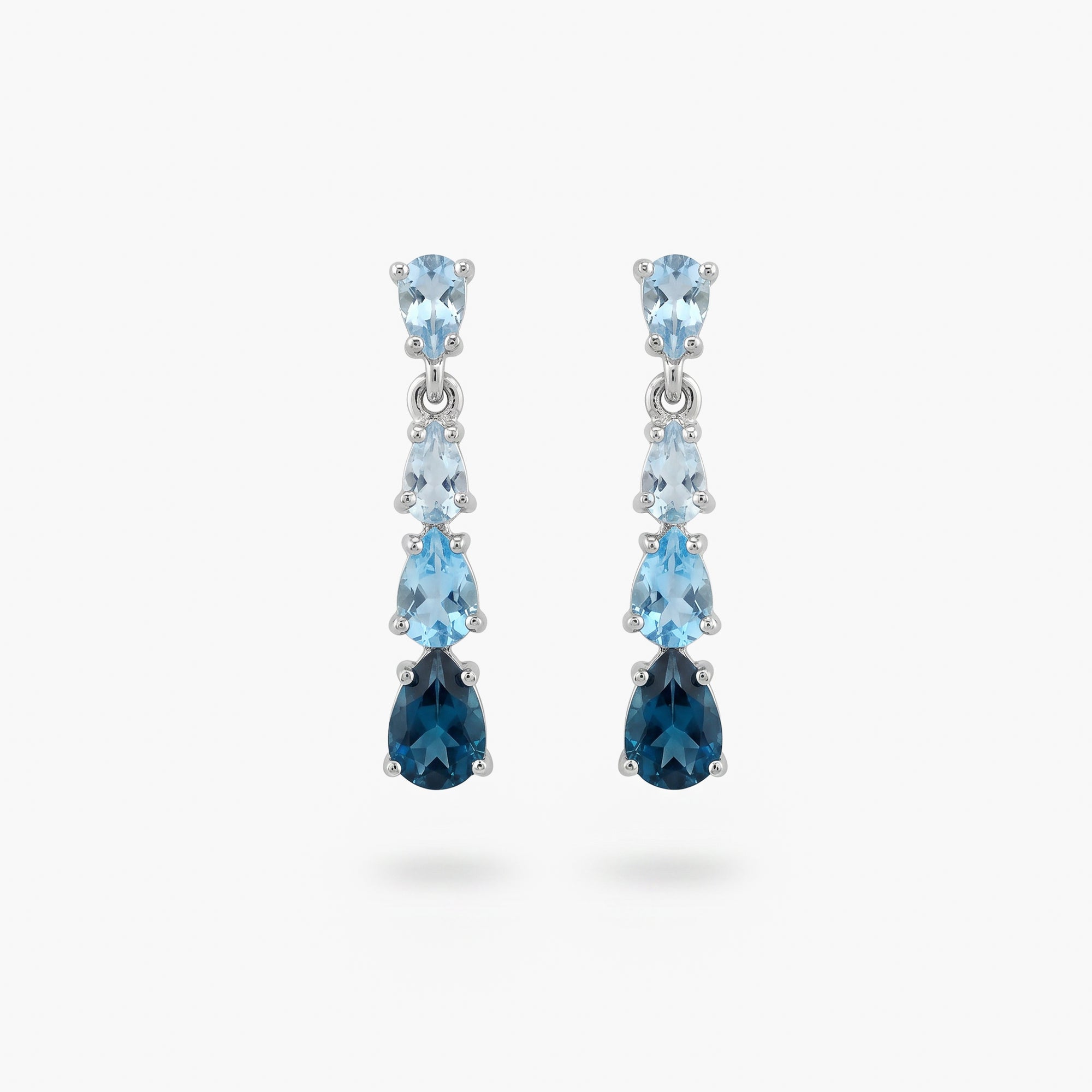 9ct White Gold Graduated Blue Topaz Pear Drop Earrings