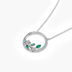 9ct White Gold Emerald and Diamond Circle Pendant Necklace - Jordans Jewellers