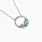 9ct White Gold Emerald and Diamond Circle Pendant Necklace - Jordans Jewellers