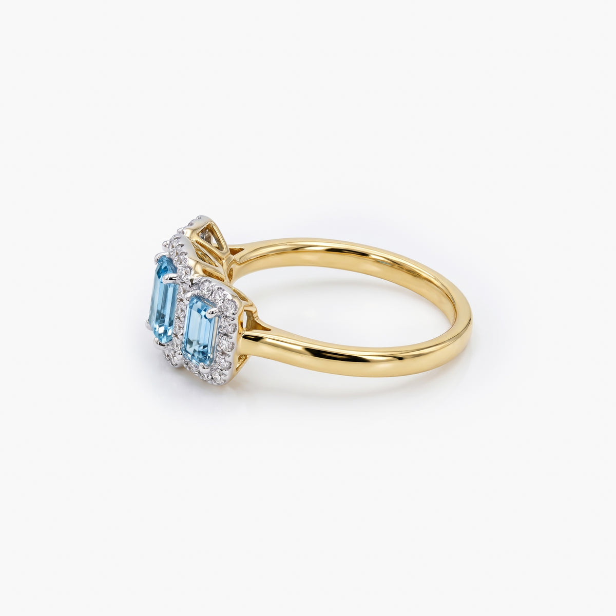 9ct Gold Sky Blue Topaz & Diamond Triple Halo Ring