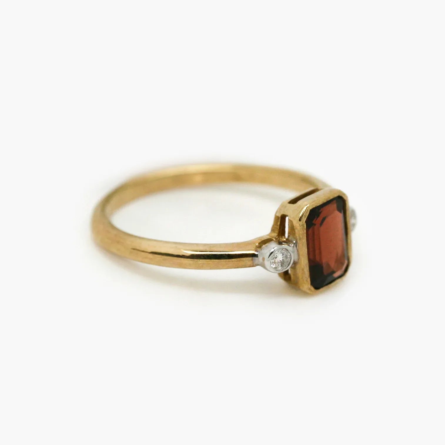 9ct Gold Garnet and Diamond Ring - Jordans Jewellers