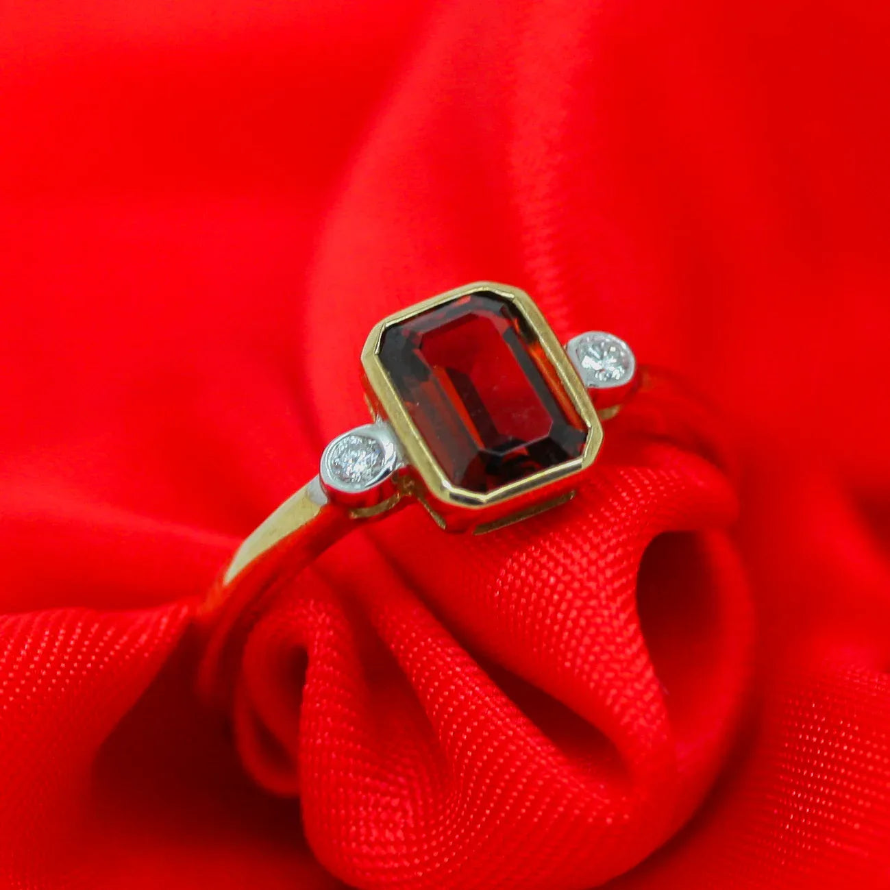 9ct Gold Garnet and Diamond Ring - Jordans Jewellers