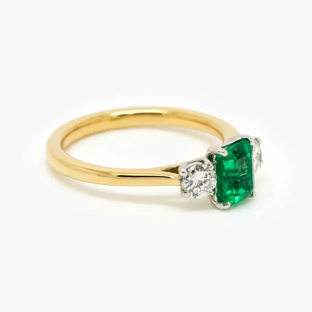 18ct Gold Emerald and Diamond Three Stone Ring - Jordans Jewellers
