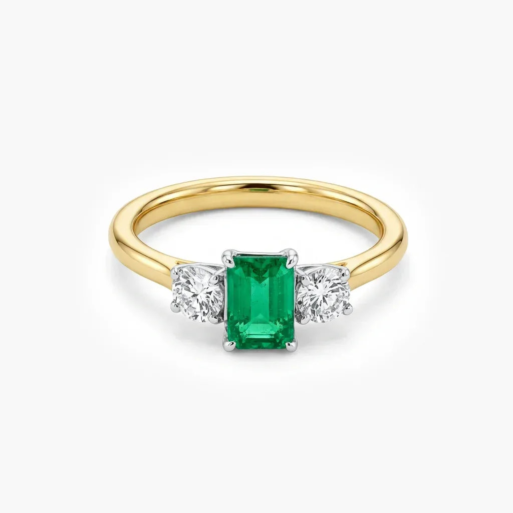18ct Gold Emerald and Diamond Three Stone Ring - Jordans Jewellers