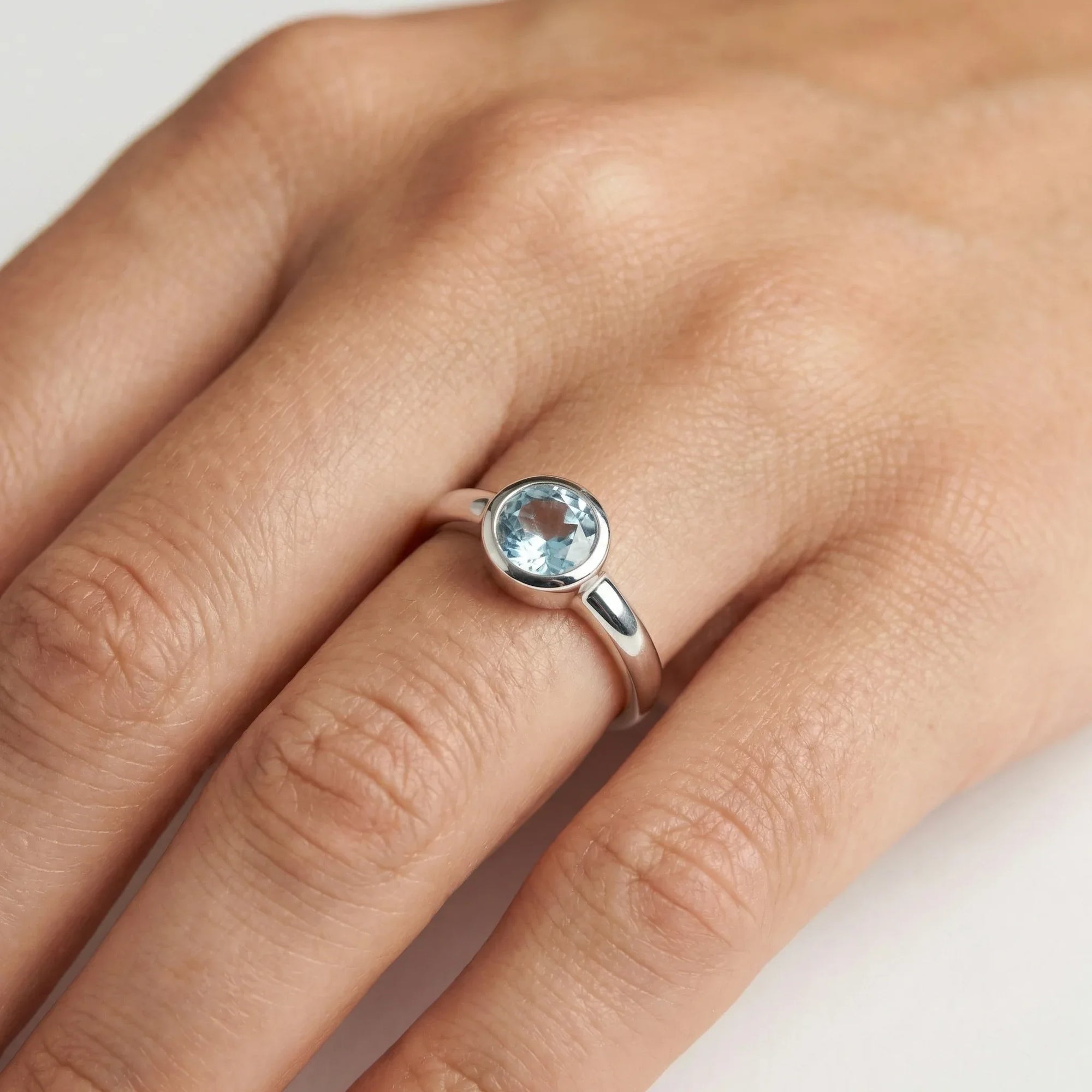 Silver Blue Topaz Solitaire Ring