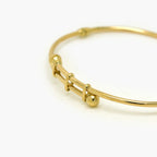 9ct Yellow Gold Double Ball Polished Bangle - Jordans Jewellers