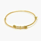 9ct Yellow Gold Double Ball Polished Bangle - Jordans Jewellers