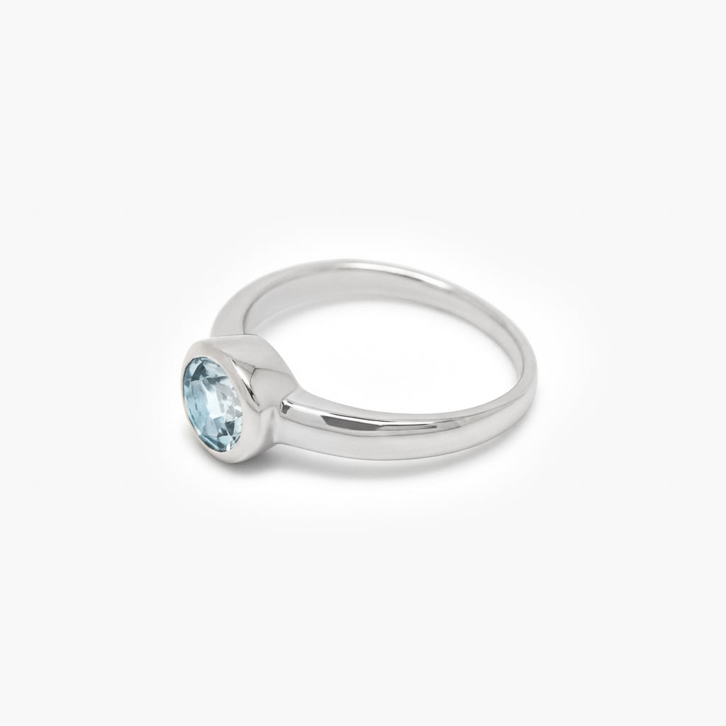 Silver Blue Topaz Solitaire Ring