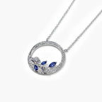 9ct White Gold Sapphire and Diamond Circle Pendant Necklace - Jordans Jewellers