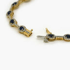 9ct Gold Sapphire and Diamond Halo Bracelet - Jordans Jewellers