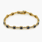 9ct Gold Sapphire and Diamond Halo Bracelet - Jordans Jewellers