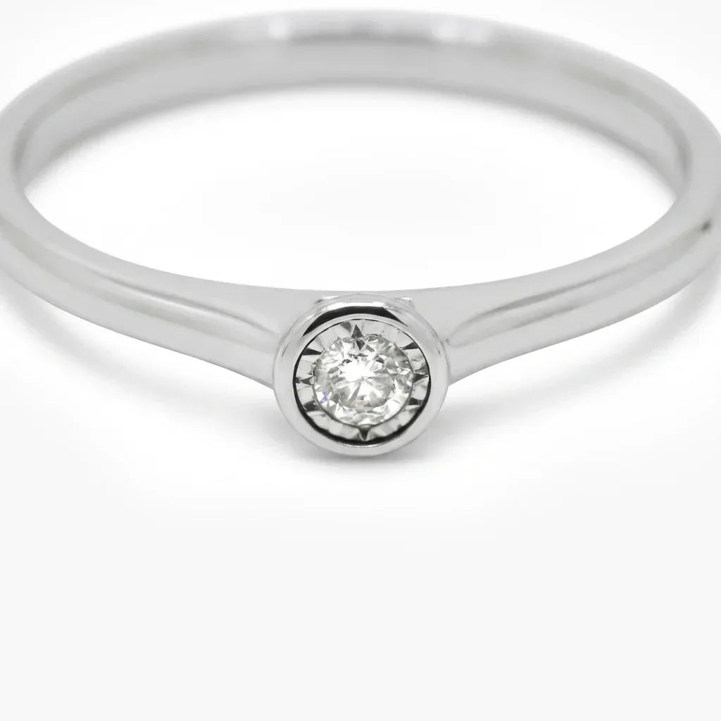 9ct White Gold Illusion Set Diamond Solitaire Ring - Jordans Jewellers