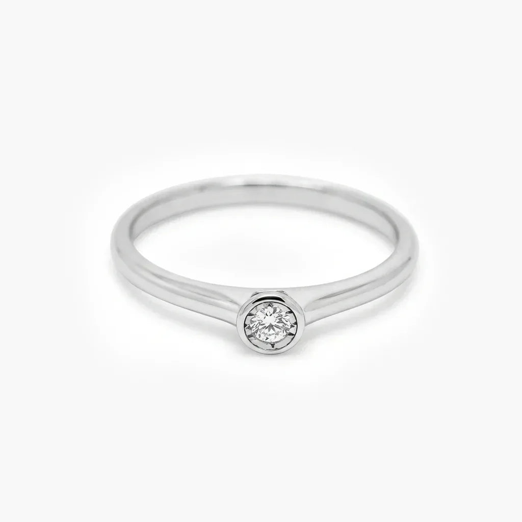 9ct White Gold Illusion Set Diamond Solitaire Ring - Jordans Jewellers