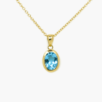 NEW 9 Carat Yellow Gold Blue Topaz Pendant Necklace - Jordans Jewellers